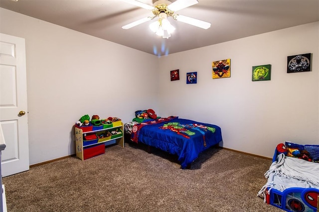 bedroom with carpet, ceiling fan, and baseboards