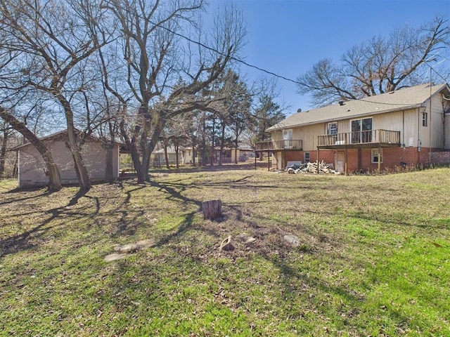 view of yard with a deck