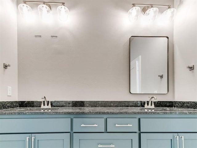 bathroom with double vanity and a sink