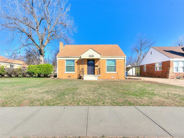 bungalow-style house with a front lawn, crawl space, and a chimney