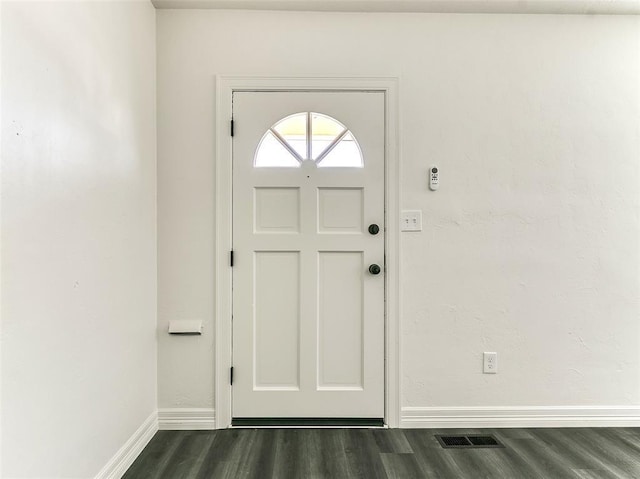 2208 N Hood St, Oklahoma City, OK 73111 - foyer entrance with baseboards and dark wood-type flooring