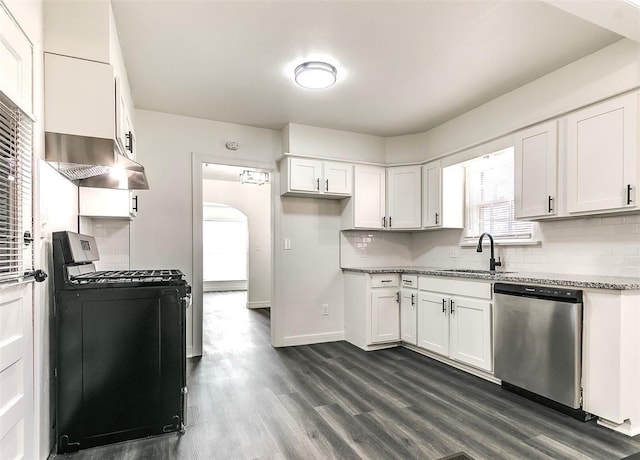 2208 N Hood St, Oklahoma City, OK 73111 - kitchen featuring dishwasher, gas range, a sink, under cabinet range hood, and dark wood finished floors