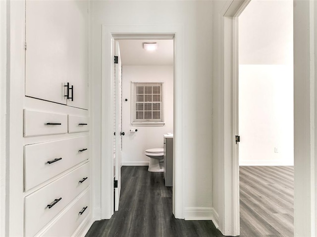 2208 N Hood St, Oklahoma City, OK 73111 - corridor featuring baseboards and dark wood-style floors