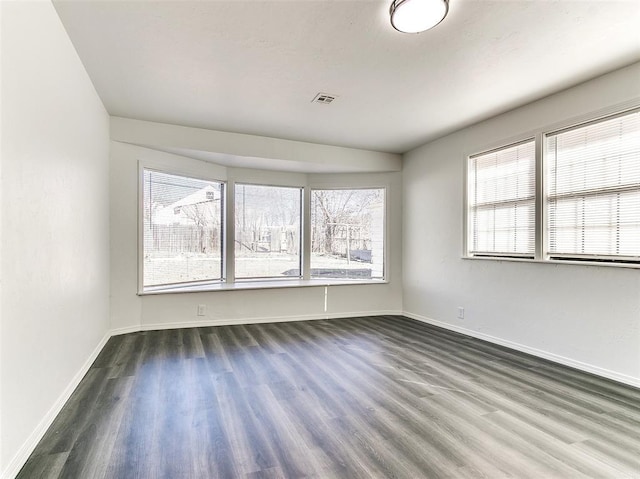 2208 N Hood St, Oklahoma City, OK 73111 - unfurnished room featuring wood finished floors and baseboards