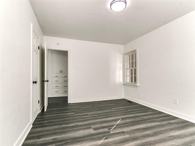 2208 N Hood St, Oklahoma City, OK 73111 - spare room with dark wood-style flooring and baseboards