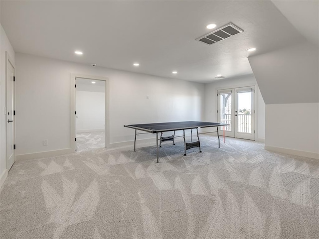 recreation room with baseboards, recessed lighting, visible vents, and light colored carpet