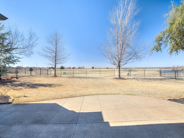 view of yard with a patio area and a fenced backyard