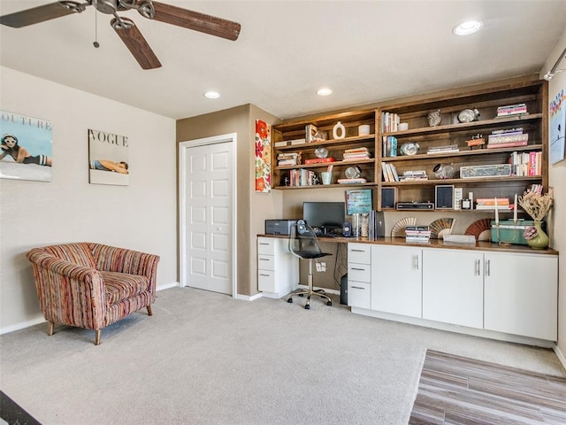 office area with a ceiling fan, recessed lighting, light carpet, and baseboards