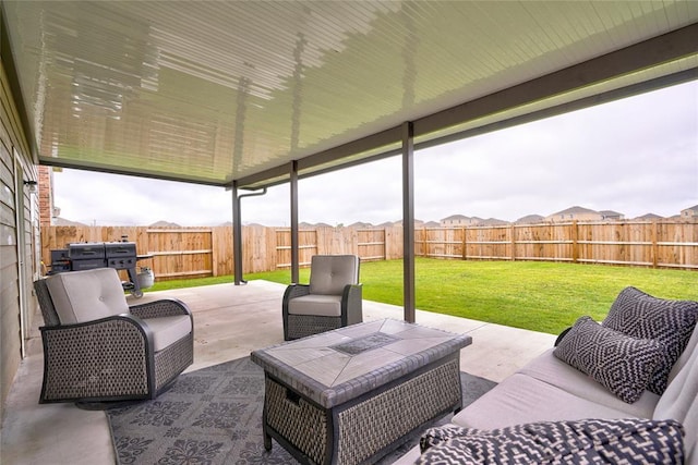 view of patio with a fenced backyard and an outdoor living space