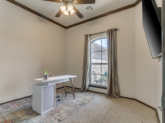 unfurnished office with a ceiling fan, visible vents, baseboards, light carpet, and crown molding