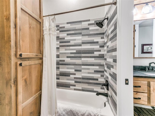 bathroom with vanity and shower / tub combo with curtain