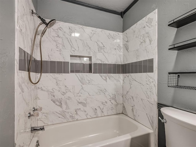 full bath featuring toilet, shower / bathtub combination, and a textured wall