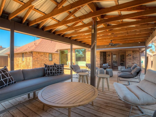 wooden terrace with outdoor lounge area