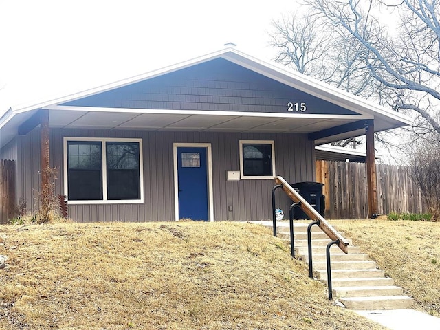 view of front of home with fence