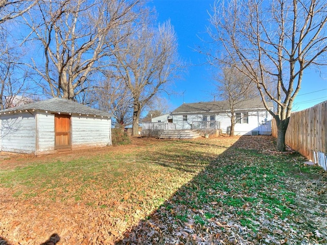 420 W Lincoln St, Purcell, OK 73080 - view of yard with a shed, fence, and an outdoor structure