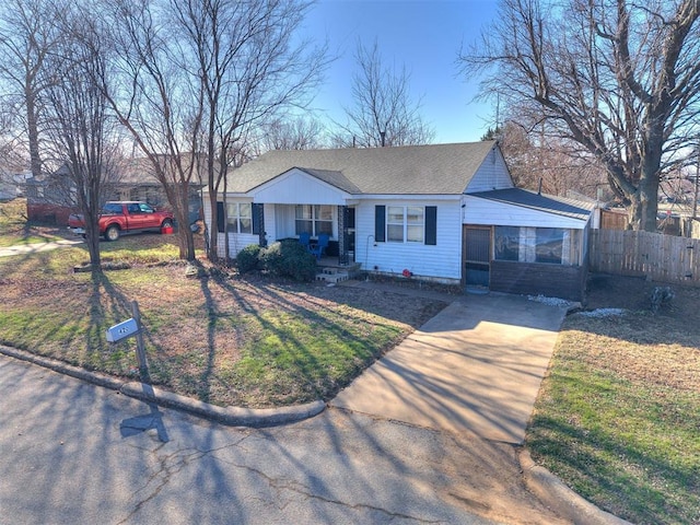 420 W Lincoln St, Purcell, OK 73080 - view of front of property featuring fence, a front lawn, and roof with shingles
