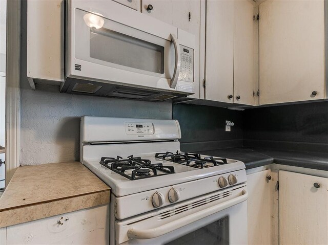 420 W Lincoln St, Purcell, OK 73080 - kitchen with white appliances