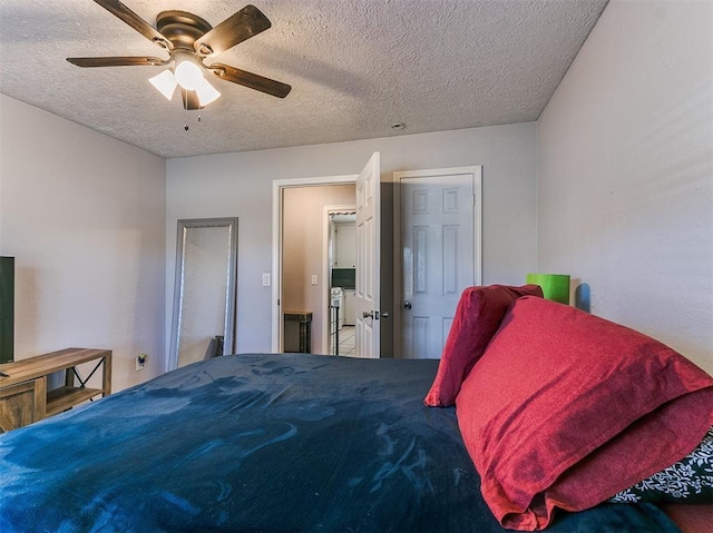 420 W Lincoln St, Purcell, OK 73080 - bedroom featuring a ceiling fan and a textured ceiling