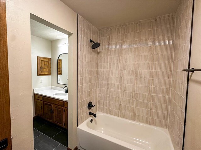 full bathroom featuring bathing tub / shower combination, vanity, and tile patterned floors