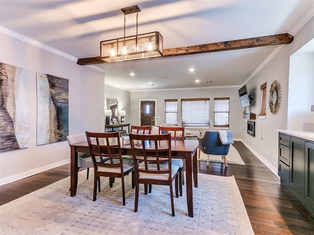 dining space with dark wood finished floors, crown molding, recessed lighting, and baseboards