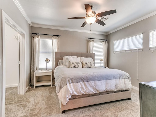 bedroom featuring baseboards, visible vents, carpet floors, ceiling fan, and crown molding