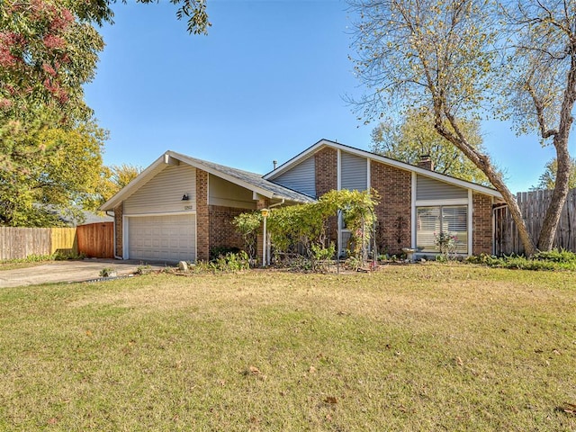 mid-century inspired home featuring a garage, brick siding, a front yard, and fence