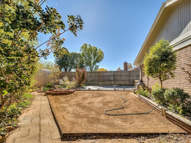 view of yard featuring a fenced backyard