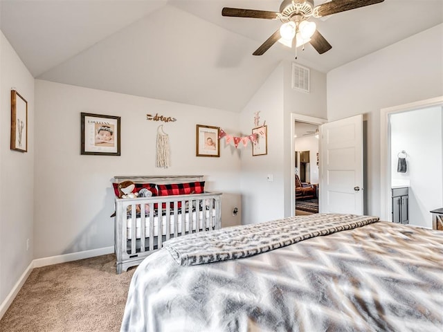 bedroom featuring baseboards, visible vents, a ceiling fan, lofted ceiling, and carpet flooring