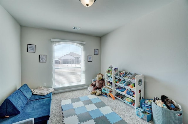 playroom featuring carpet flooring and visible vents