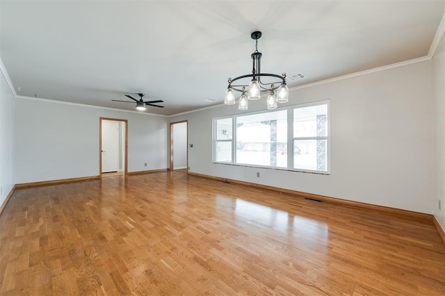 spare room with visible vents, baseboards, light wood-style floors, crown molding, and ceiling fan with notable chandelier