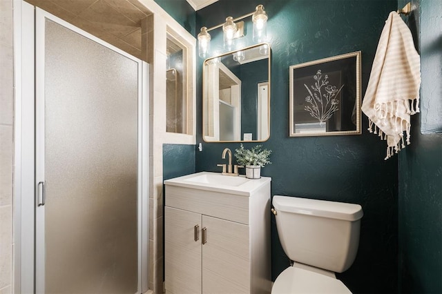 full bath with a shower stall, toilet, and a textured wall