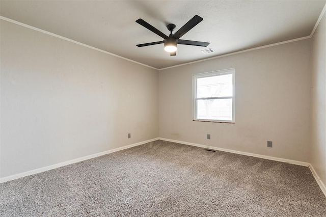 unfurnished room featuring a ceiling fan, carpet, baseboards, and ornamental molding