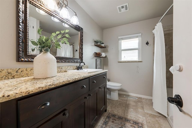 full bath with vanity, toilet, baseboards, and visible vents