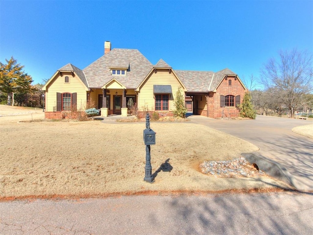 view of front of home with a chimney