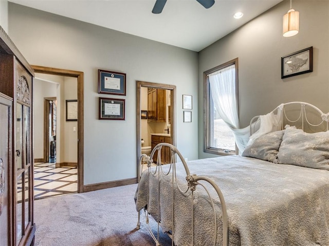 bedroom with recessed lighting, ensuite bathroom, a ceiling fan, carpet flooring, and baseboards