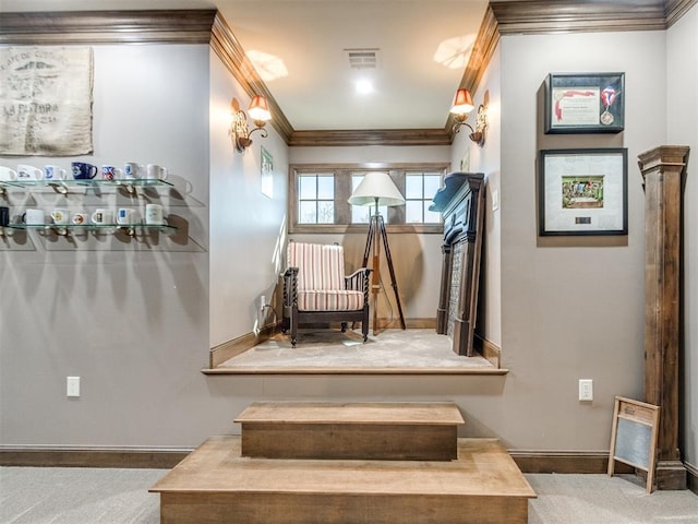 staircase with baseboards, visible vents, and crown molding