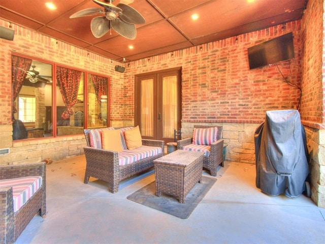 view of patio / terrace with ceiling fan and outdoor lounge area