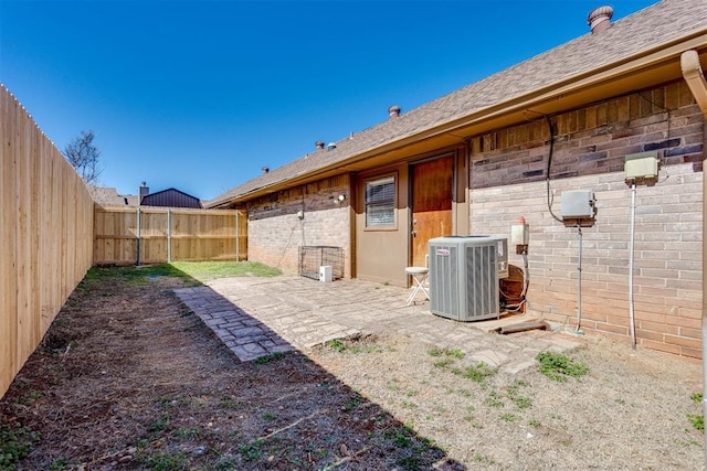 view of yard featuring a fenced backyard and cooling unit