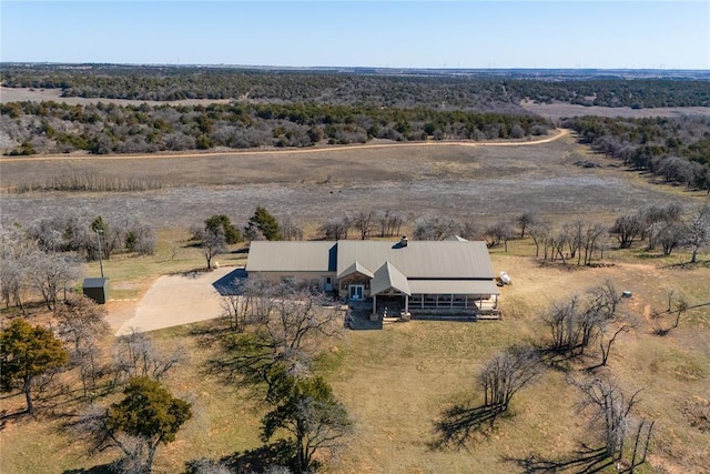 birds eye view of property featuring a rural view