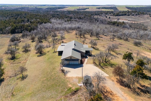 birds eye view of property featuring a rural view