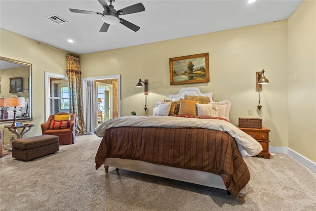 bedroom with visible vents, a ceiling fan, baseboards, and carpet floors