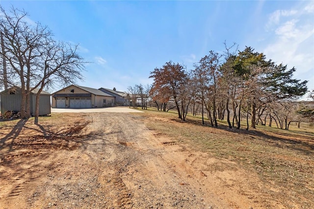 view of road with driveway