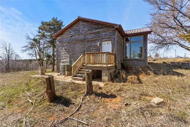 view of front of house with a standing seam roof and metal roof