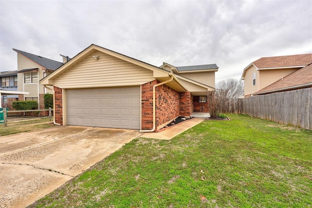 view of front facade featuring brick siding, fence, concrete driveway, a front yard, and a garage