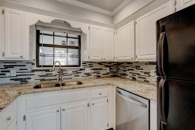 kitchen featuring freestanding refrigerator, a sink, decorative backsplash, stainless steel dishwasher, and crown molding