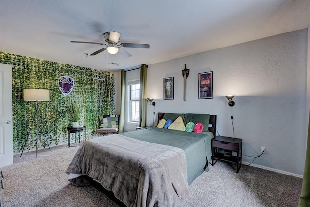 bedroom with baseboards, carpet floors, and ceiling fan