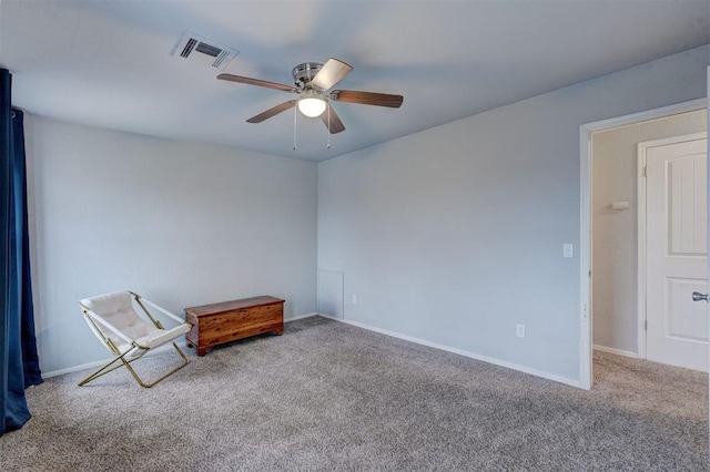 interior space with visible vents, baseboards, and a ceiling fan