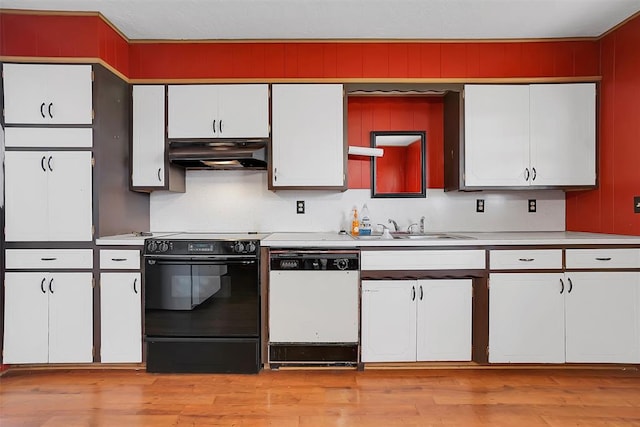 kitchen with black electric range oven, white cabinetry, a sink, dishwasher, and under cabinet range hood