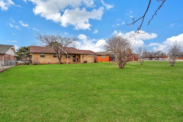 view of yard featuring fence