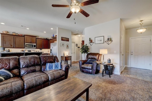 living area with baseboards, visible vents, recessed lighting, ceiling fan, and light carpet